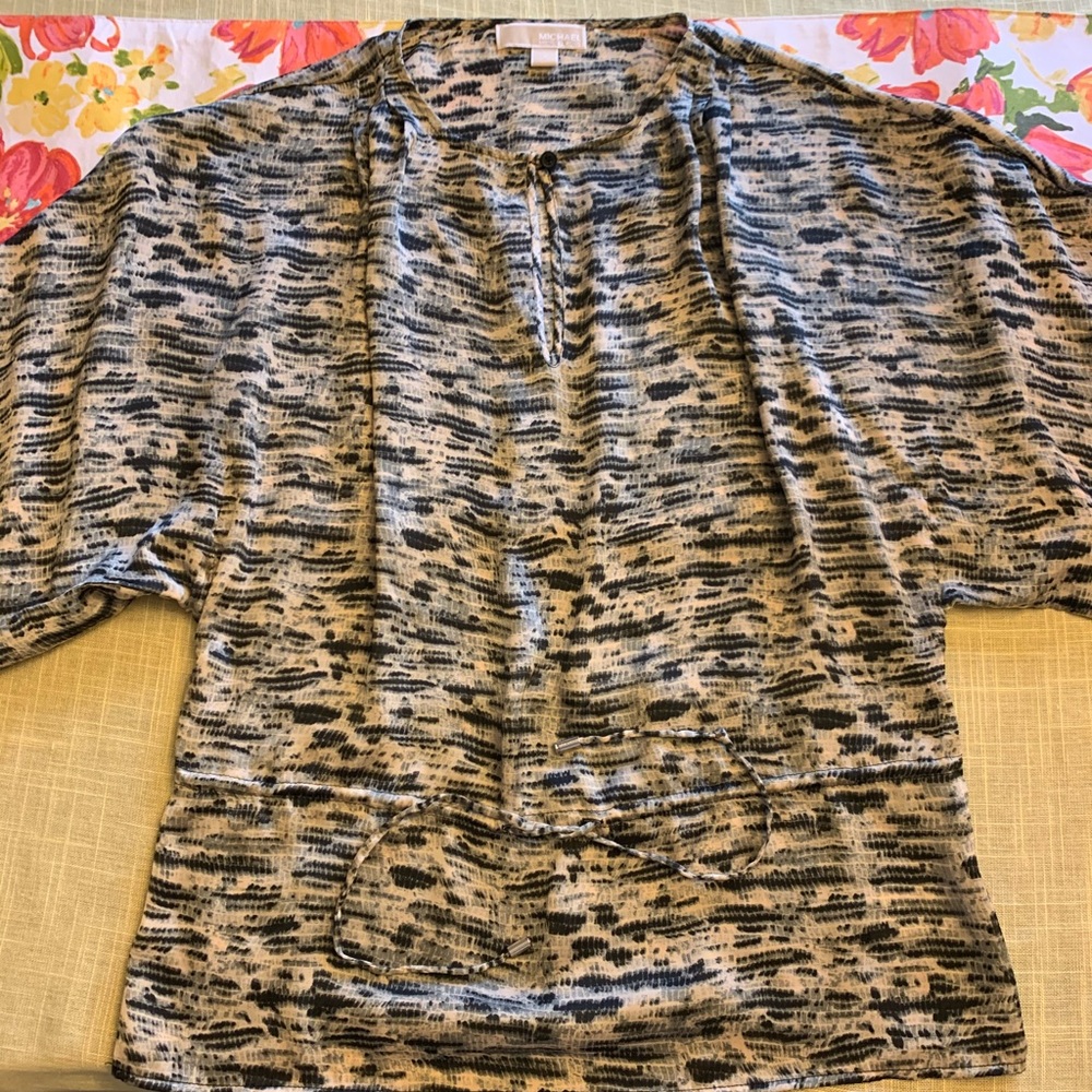 Michael Kora top